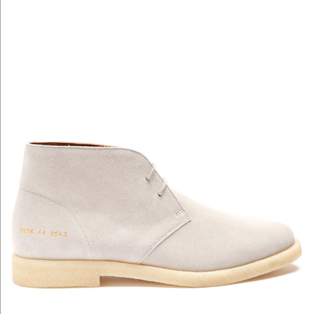 Woman by a Common Projects